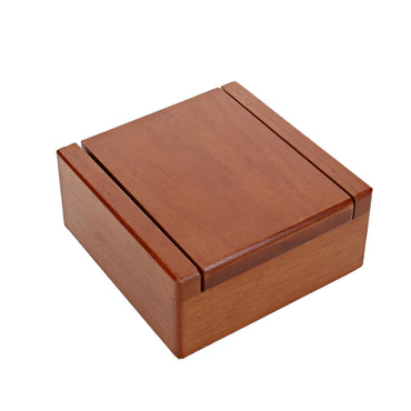 Old-Fashioned Metal Jacks in a Wooden Box