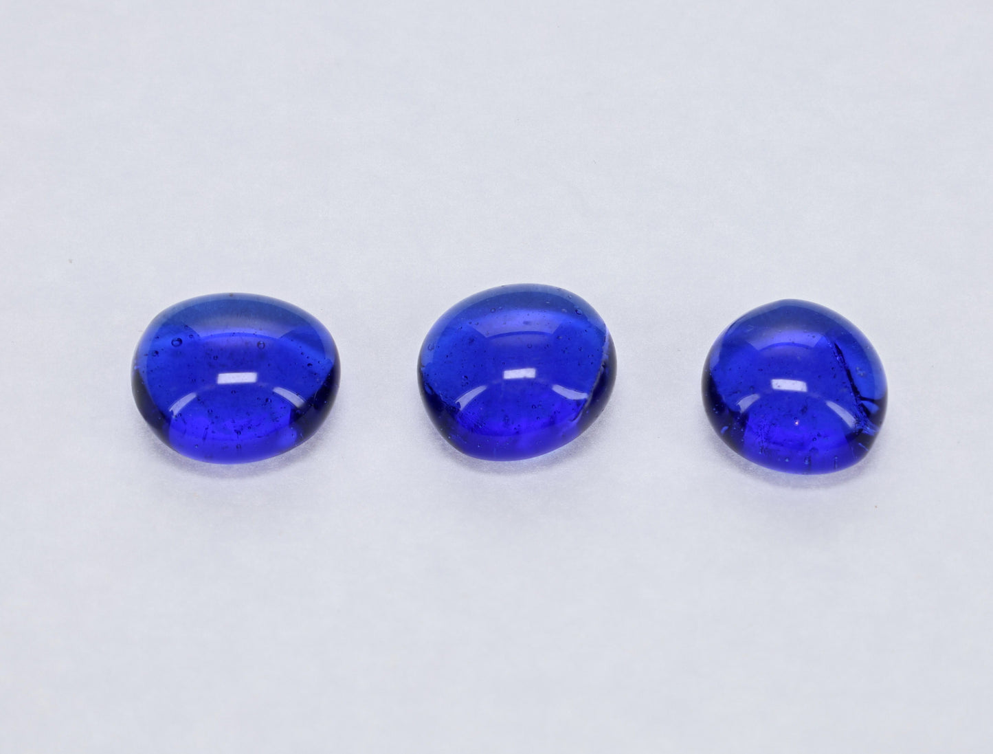 WE Games Glass Mancala Stones in Blue, Black, and Clear