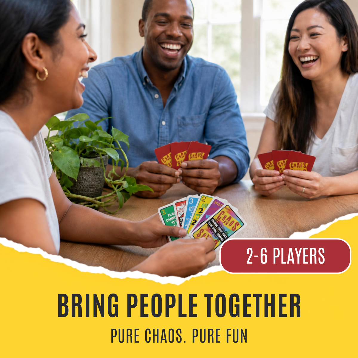 Three people laughing and playing a card game around a wooden table, with a bright yellow graphic overlay at the bottom reading 'BRING PEOPLE TOGETHER' and 'PURE CHAOS. PURE FUN' plus a '2-6 PLAYERS' badge.