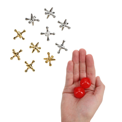 Old-Fashioned Metal Jacks in a Wooden Box
