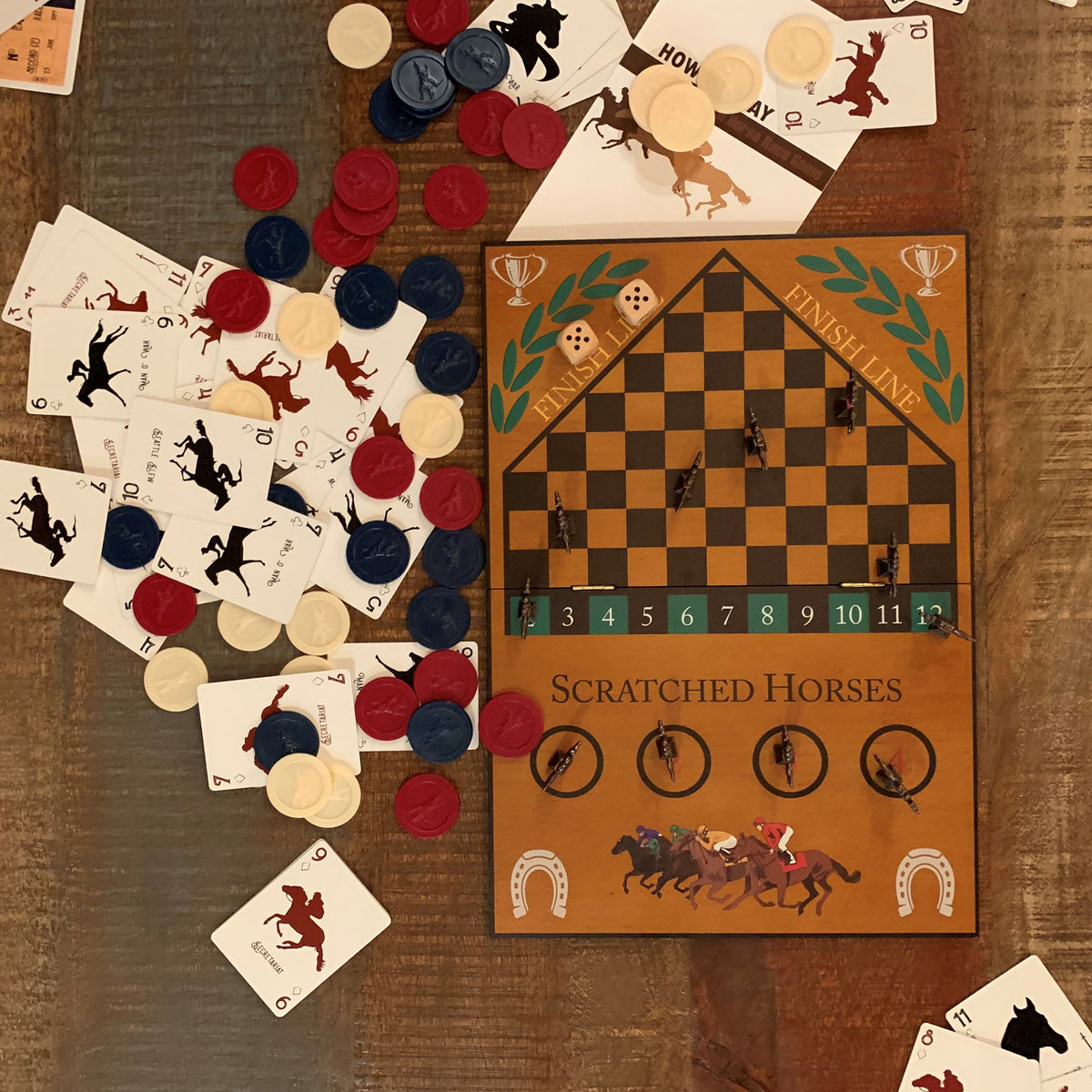 Board game with horse racing theme on a wooden surface