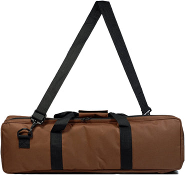 Brown travel canvas bag with carrying handle and shoulder strap.