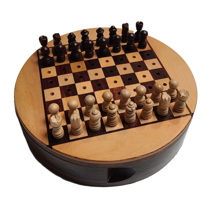 Mini wooden chess set - round for travel. Wooden traveling chess board shaped as a tin and has removeable lid. Small portable chess board set.
